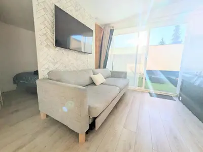 Coin salon dans l'établissement Suite Évasion Spa - Tiny House