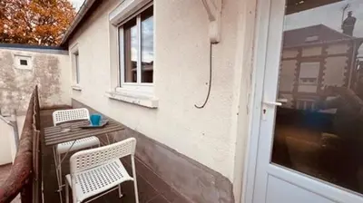 Coin salon dans l'établissement Le Donnette - Appt lumineux - accès métro Rouen