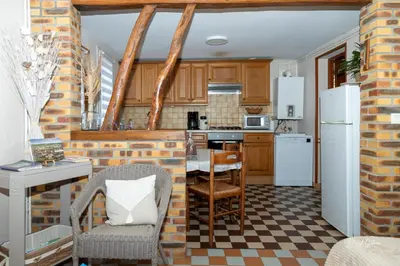 Cuisine ou kitchenette dans l'établissement oreedesetangs80