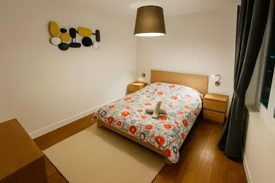 Un ou plusieurs lits dans un hébergement de l'établissement Charmant T3 lumineux tout confort - 416 Elbeuf 1