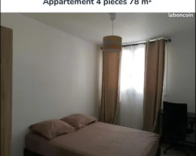 Un ou plusieurs lits dans un hébergement de l'établissement Bel Appartement de 78m2