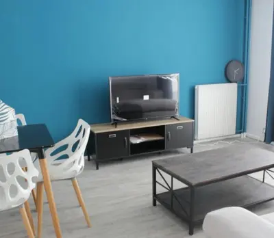 Télévision ou salle de divertissement dans l'établissement Bel Appartement de 78m2