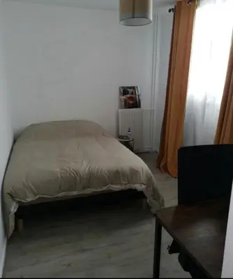 Un ou plusieurs lits dans un hébergement de l'établissement Bel Appartement de 78m2