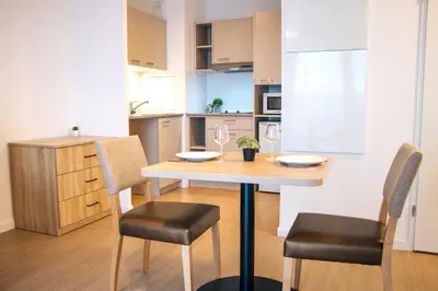 Cuisine ou kitchenette dans l'établissement Résidence Nouvelles Sylphides Carrières-sous-Poissy