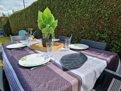 Jardin de l'établissement Maison 3 personnes entre lac et forêt
