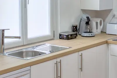 Cuisine ou kitchenette dans l'établissement L'explorateur - Entièrement refait - Hyper centre