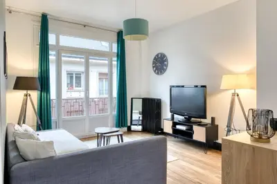 Télévision ou salle de divertissement dans l'établissement Le Séjour Normand - Centre-Ville Proche Cathédrale