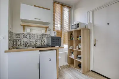 Cuisine ou kitchenette dans l'établissement Le Belgium