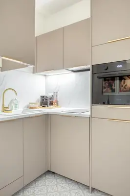 Cuisine ou kitchenette dans l'établissement Le Lauroise magnifique F2 place des Carmes