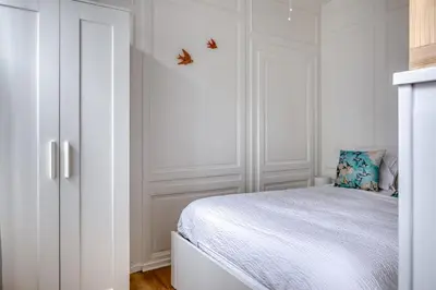 Un ou plusieurs lits dans un hébergement de l'établissement Blue Bird charmant studio avec place de parking !