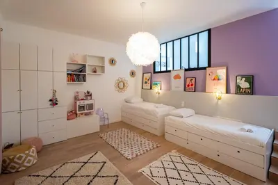 Un ou plusieurs lits dans un hébergement de l'établissement Sublime maison in Mezy sur seine