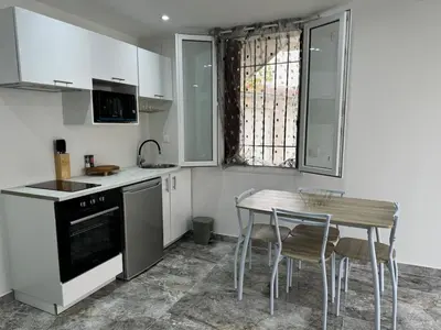 Cuisine ou kitchenette dans l'établissement Studio le Plessis