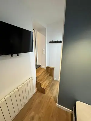 Télévision ou salle de divertissement dans l'établissement Pause & Bulles