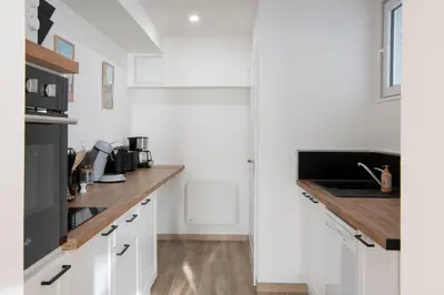 Cuisine ou kitchenette dans l'établissement Au pied du Clocher - Centre ville