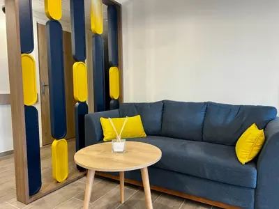 Coin salon dans l'établissement Cosy Diem Franconville