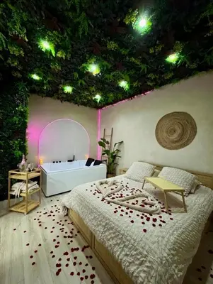 Un ou plusieurs lits dans un hébergement de l'établissement Suite Bali Love - Love Room - Jacuzzi