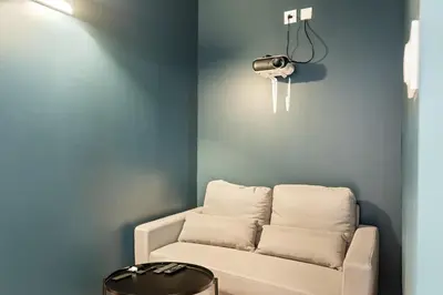 Coin salon dans l'établissement Grand Appart 4 Chambres avec Cinéma dans Rouen Centre