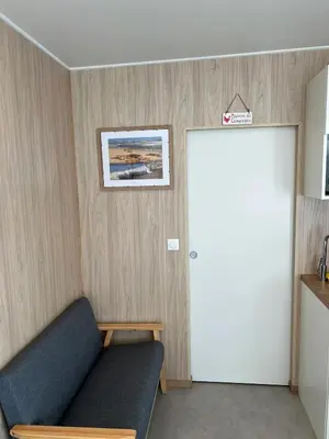 Coin salon dans l'établissement Chalet charmant à Acheux-en-Vimeu, 20 m², jardin