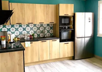 Cuisine ou kitchenette dans l'établissement La petite cauchoise