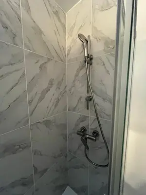 Salle de bains dans l'établissement Le petit Rouennais