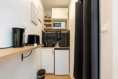 Cuisine ou kitchenette dans l'établissement Le Cloudy Cocon calme hypercentre - 418