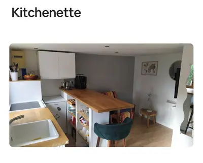 Cuisine ou kitchenette dans l'établissement Maisonnette centre ville