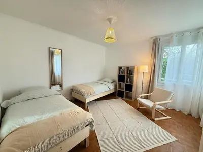 Un ou plusieurs lits dans un hébergement de l'établissement La Maison Mantaise