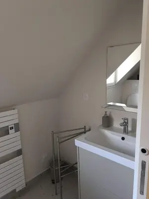 Cuisine ou kitchenette dans l'établissement Appartement résidence historique centre de Vernon