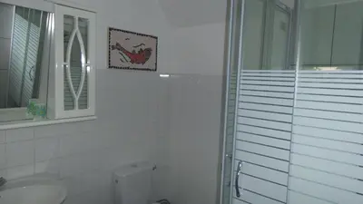 Salle de bains dans l'établissement Gite Les Oiseaux