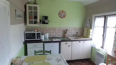 Cuisine ou kitchenette dans l'établissement Gite Les Oiseaux
