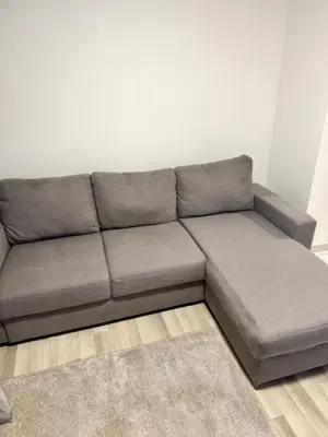 Coin salon dans l'établissement Appartement à 10 minutes du centre-ville