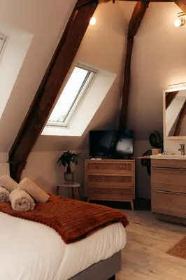 Télévision ou salle de divertissement dans l'établissement Maison Le Catelier