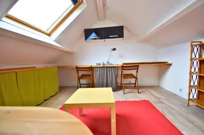 Télévision ou salle de divertissement dans l'établissement Chambly Green Family House