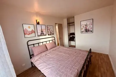 Un ou plusieurs lits dans un hébergement de l'établissement Alma Sweet Home