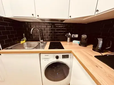 Cuisine ou kitchenette dans l'établissement Alma Sweet Home
