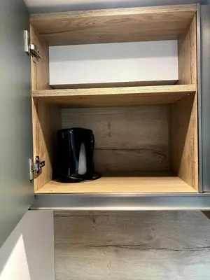 Cuisine ou kitchenette dans l'établissement Les Cottages du Manoir Logement 1