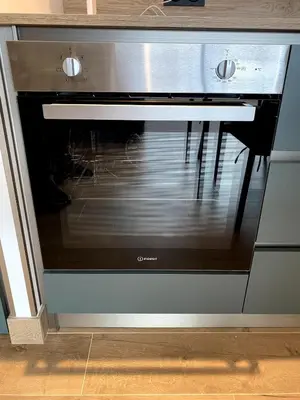 Cuisine ou kitchenette dans l'établissement Les cottages du Manoir Logement 2