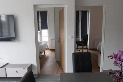 Télévision ou salle de divertissement dans l'établissement Le Van G-Home