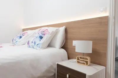 Un ou plusieurs lits dans un hébergement de l'établissement Le Van G-Home