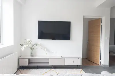 Télévision ou salle de divertissement dans l'établissement Le Van G-Home