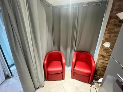 Coin salon dans l'établissement Super Atypique T1 - 007