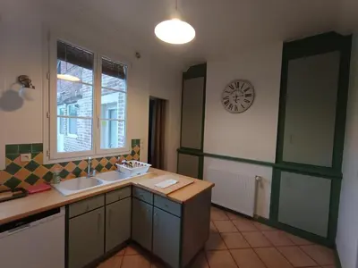 Cuisine ou kitchenette dans l'établissement La parenthèse de Forges les eaux