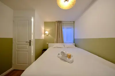 Un ou plusieurs lits dans un hébergement de l'établissement Elbeuf - Appartement moderne pour 4