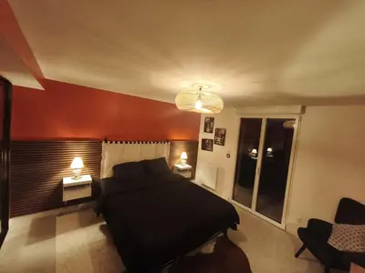 Un ou plusieurs lits dans un hébergement de l'établissement Cocon sensuel - Jaccuzzi et petit déjeuner - Proche Chantilly et Beauvais
