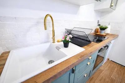 Cuisine ou kitchenette dans l'établissement Maison T3- accès voie verte et transports