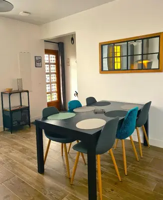 Coin salon dans l'établissement Le Gîte Avîlloîs Famîly