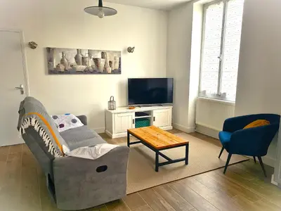Télévision ou salle de divertissement dans l'établissement Le Gîte Avîlloîs Famîly