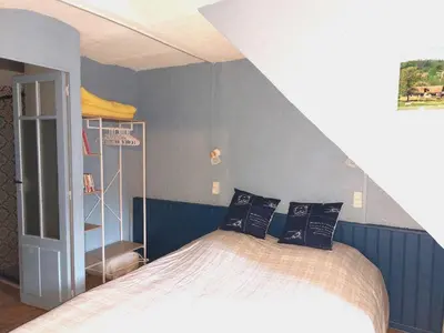 Un ou plusieurs lits dans un hébergement de l'établissement Appartement cosy dans le quartier du Vieux Tréport