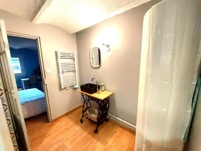 Un ou plusieurs lits dans un hébergement de l'établissement Appartement cosy dans le quartier du Vieux Tréport