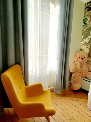 Coin salon dans l'établissement Charme et confort au cœur de Maisons-Laffitte